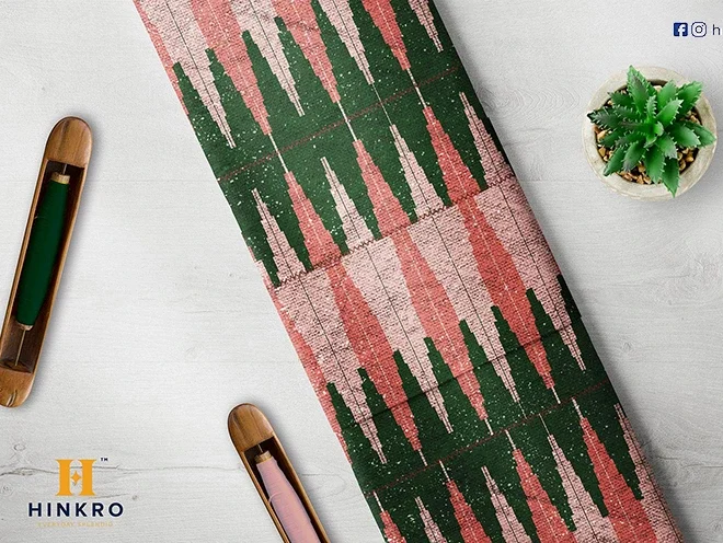 Emerald green and peach Hinkro Kente pattern weave fabric