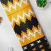 Black, gold and white with gold shimmering kente